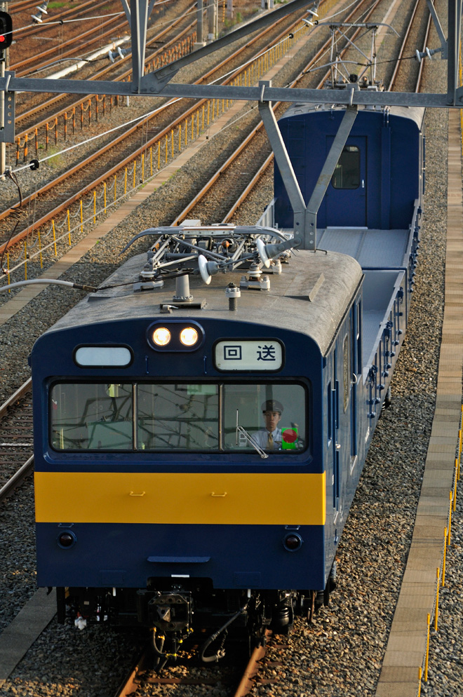 【JR西】クル144-15＋クモル145-1015 吹田総合車両所出場を千里丘駅で撮影した写真