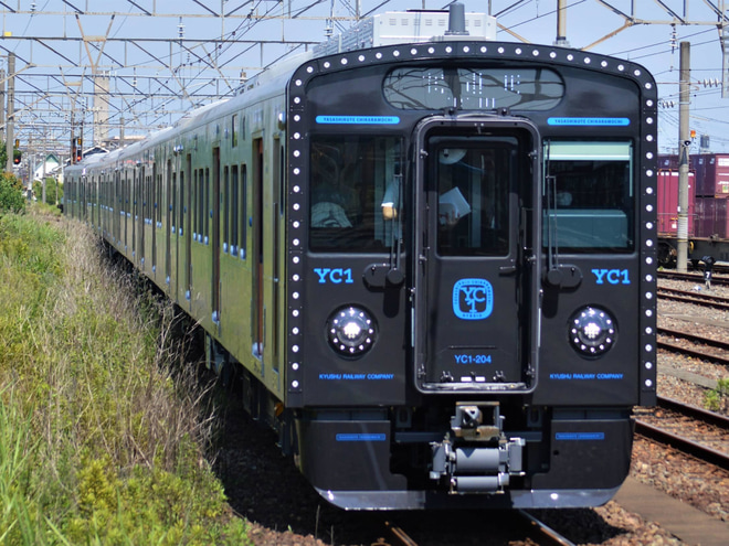 【JR九】YC1系小倉総合車両センター出場試運転を鍋島駅で撮影した写真