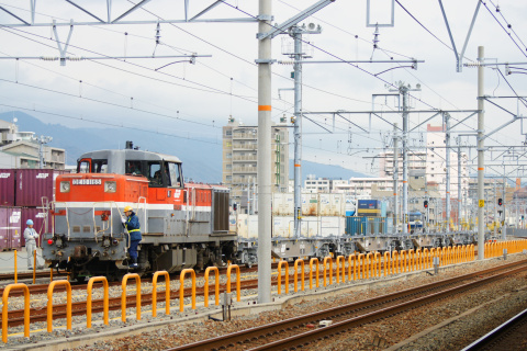 【JR貨】コキ100系107形 甲種輸送を鷹取駅で撮影した写真