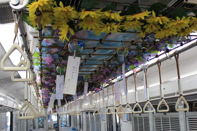 【能勢電】『のせでん夏物語《風の音色》装飾電車』運行を日生中央駅で撮影した写真
