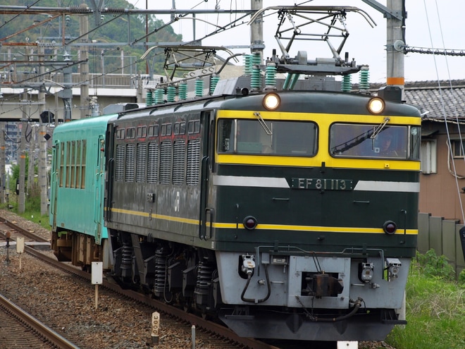 【JR西】キハ120-201 後藤総合車両所入場配給 を島本駅で撮影した写真