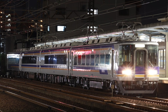 【南海】10000系10007F千代田出場回送を住吉東駅で撮影した写真