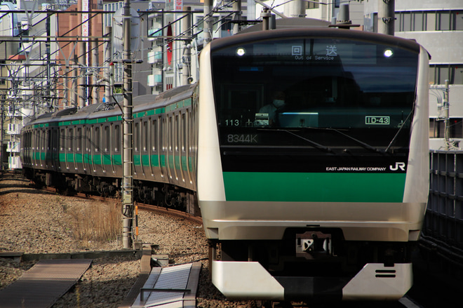 【JR東】E233系113編成東京総合車両センター入場回送を恵比寿駅で撮影した写真
