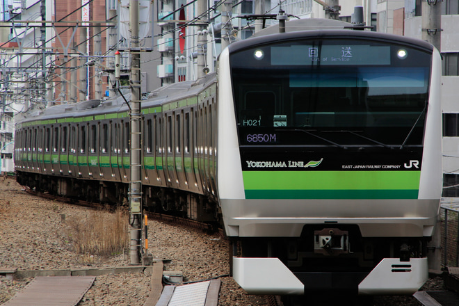 【JR東】E233系H021編成東京総合車両センター入場回送を恵比寿駅で撮影した写真