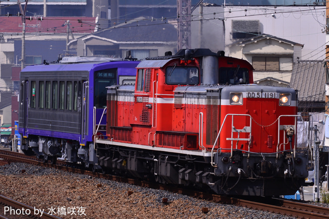 【JR西】キハ120-12後藤総合車両所出場配給を塚本駅で撮影した写真