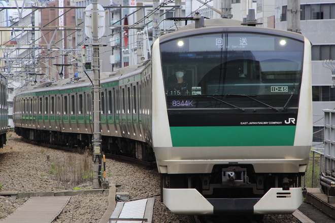 【JR東】E233系ハエ115編成東京総合車両センター入場回送を恵比寿駅で撮影した写真