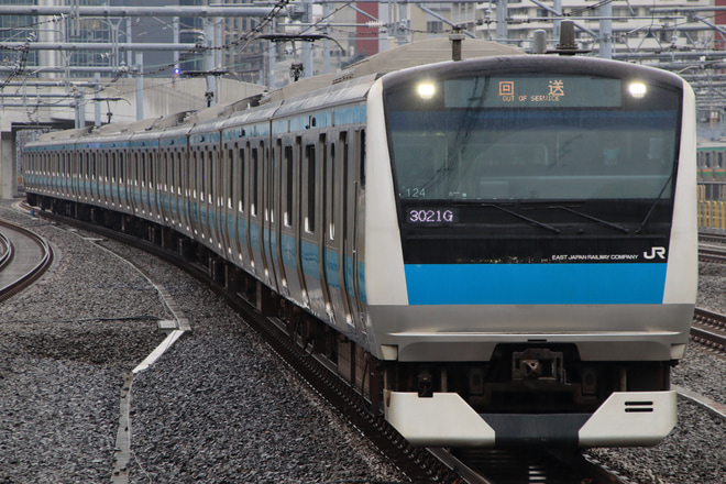 【JR東】E233系サイ124編成東京総合車両センター入場回送を高輪ゲートウェイ駅で撮影した写真