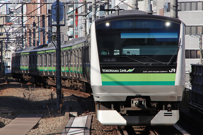 【JR東】E233系H014編成東京総合車両センター入場回送を恵比寿駅で撮影した写真