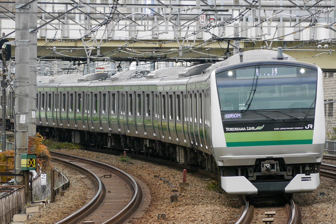 【JR東】E233系H023編成東京総合車両センター入場回送を五反田駅で撮影した写真