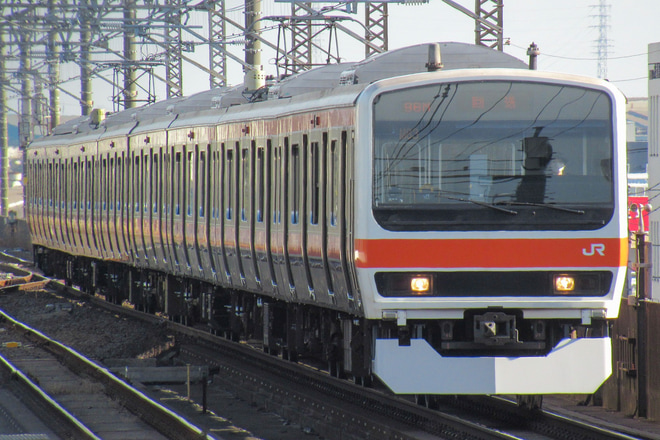 【JR東】209系M83編成東京総合車両センター出場回送を千葉みなと駅で撮影した写真