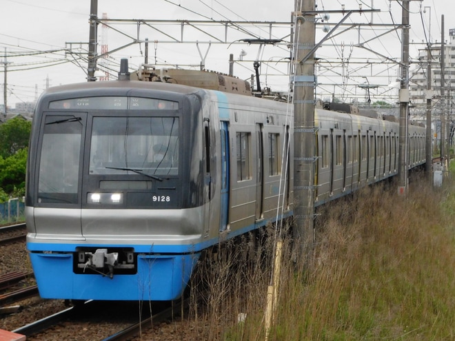【北総】9100形9128編成宗吾車両基地から返却回送を京成大和田駅で撮影した写真