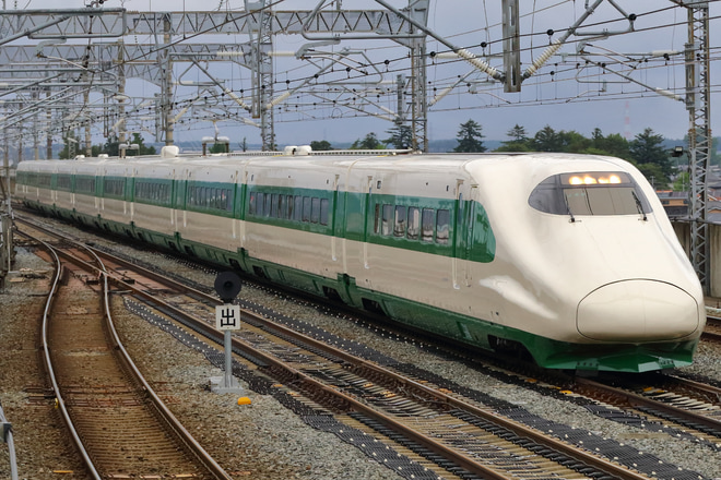 【JR東】E2系J66編成(200系塗装)出場試運転を古川駅で撮影した写真