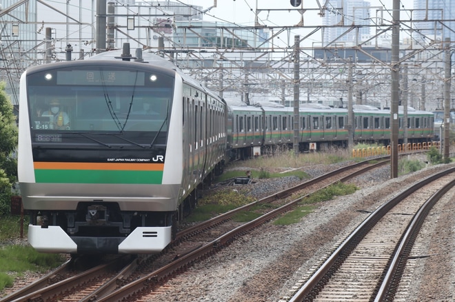 【JR東】E233系E-15編成東京総合車両センター出場回送を新川崎駅で撮影した写真