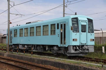 【JR西】キハ120-202が水色塗装の姿で後藤総合車両所本所を出場試運転