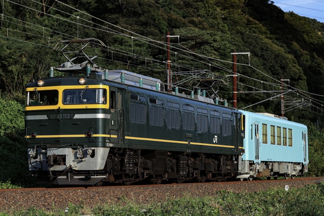 【JR西】キハ120-202(水色)が後藤総合車両所本所出場し配給輸送を不明で撮影した写真