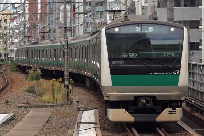 【JR東】E233系ハエ110編成東京総合車両センター入場回送を恵比寿駅で撮影した写真