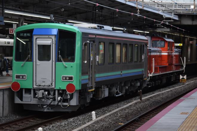 【JR西】キハ120-344 後藤総合車両所出場配給を新大阪駅で撮影した写真
