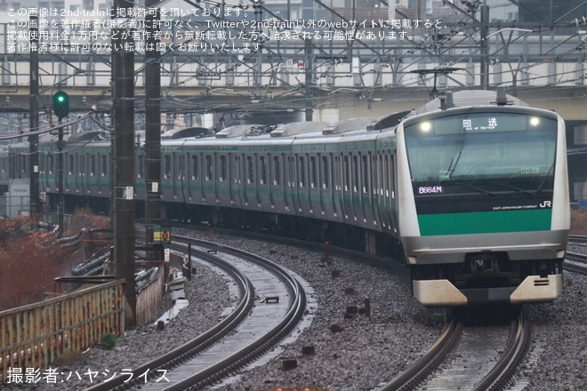 【JR東】E233系ハエ105編成東京総合車両センター入場回送を五反田駅で撮影した写真