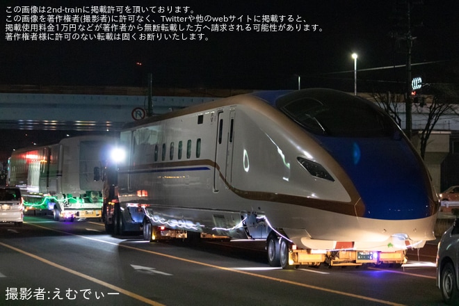 【JR東】E7系F46編成新幹線総合車両センターへ陸送を不明で撮影した写真