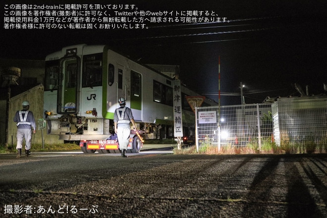 【JR東】キハ110−203新津運輸区へ陸送を不明で撮影した写真