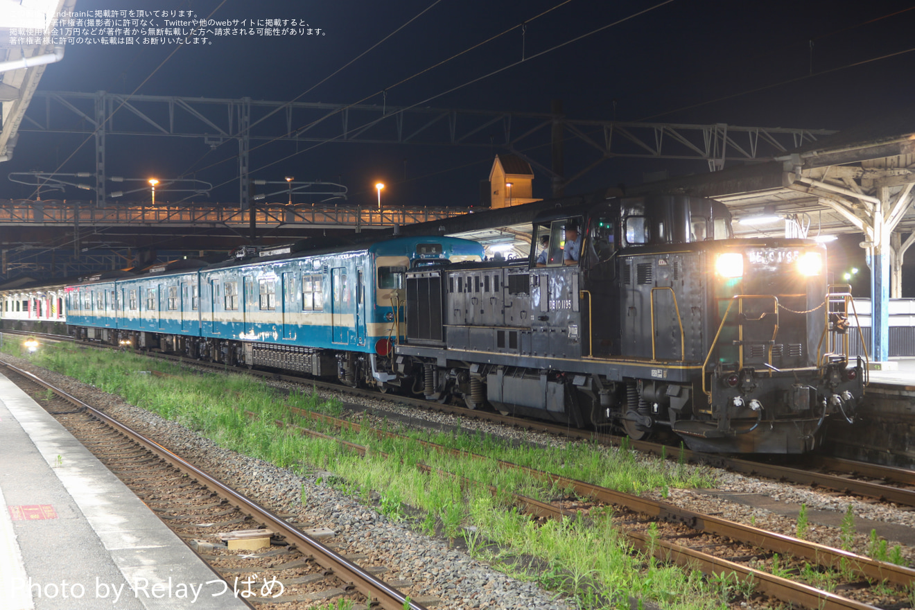 【JR九】103系E12編成が国鉄色復刻塗装 となり小倉総合車両センター出場の拡大写真