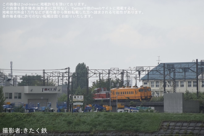 【いさりび】キハ40-1814(山吹色)が苗穂工場へを不明で撮影した写真