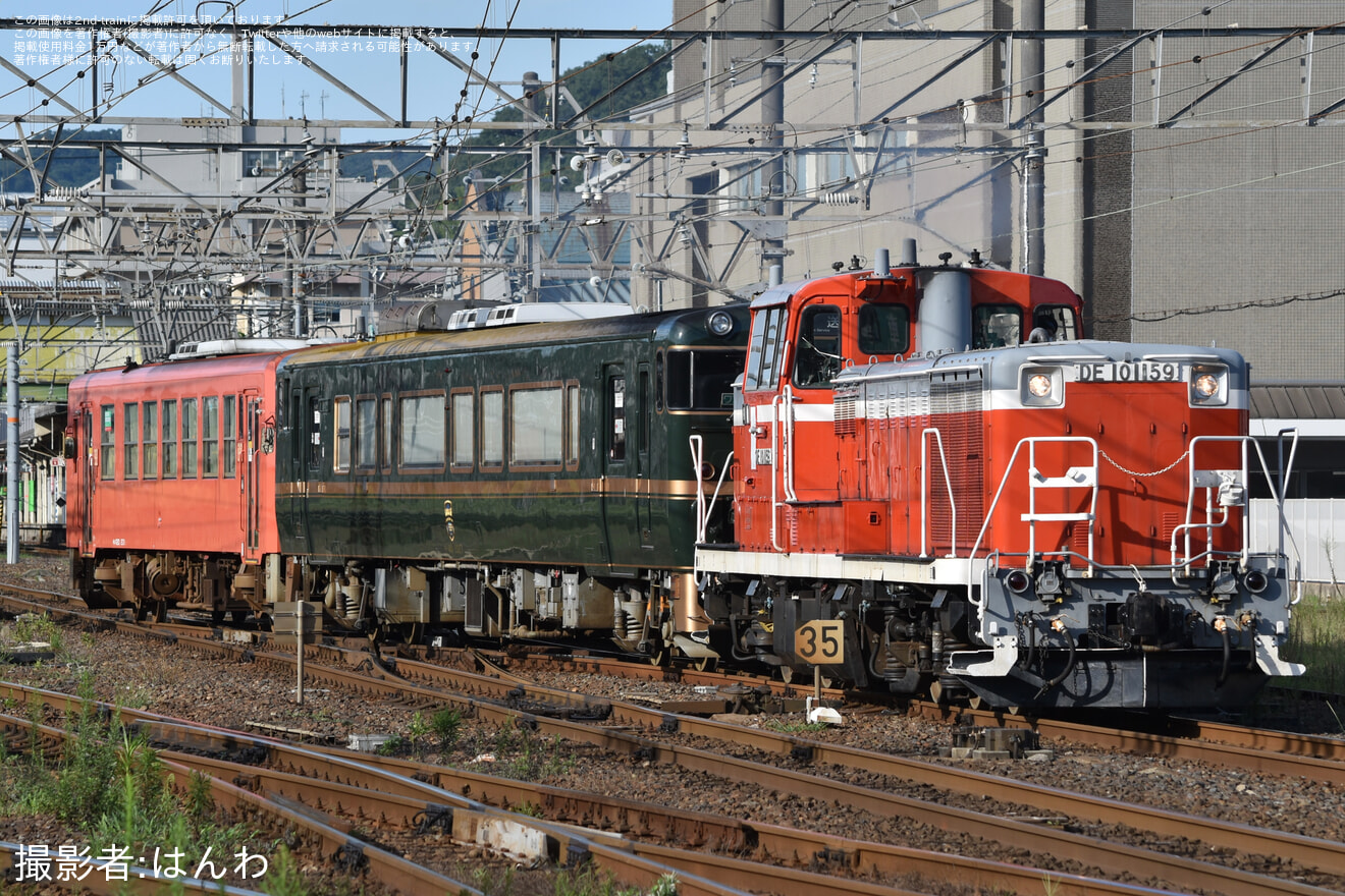 【JR西】キハ40-2027+キハ120-201 後藤総合車両所本所本所入場配給の拡大写真