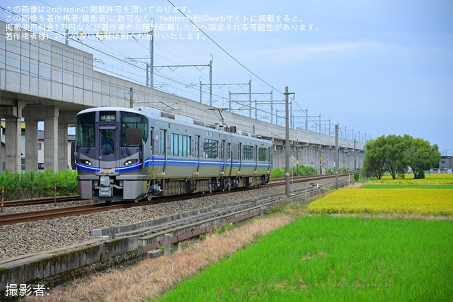 【JR西】521系J06編成が金沢総合車両所本所出場試運転を不明で撮影した写真