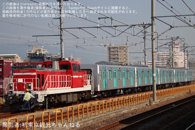 【西武】40000系40163F出場甲種輸送を鷹取駅で撮影した写真