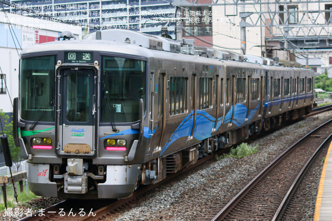 【あい鉄】521系AK16編成 吹田総合車両所出場返却回送を島本駅で撮影した写真