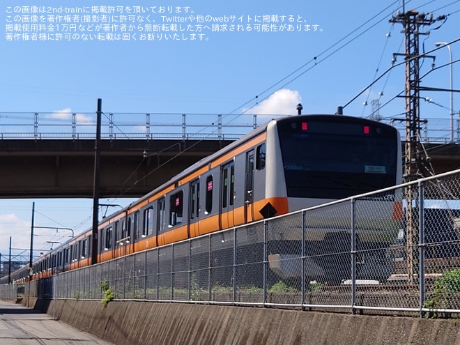 【JR東】E233系トタT71編成がホームドア対応工事を終えて武蔵小金井から豊田へ回送を豊田車両センター付近で撮影した写真