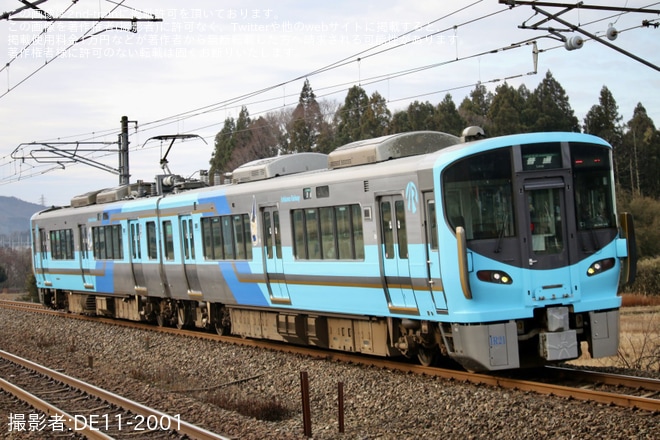 【IR】521系IR21編成がIRカラー(黄土色)にを不明で撮影した写真