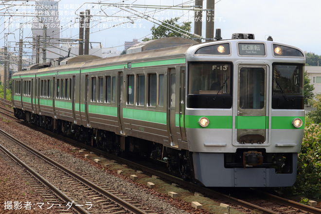 【JR北】721系 F-13編成 苗穂工場出場試運転を森林公園駅で撮影した写真