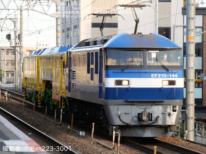 【JR西】広島方面マルチプルタイタンパー甲種輸送を甲子園口駅で撮影した写真