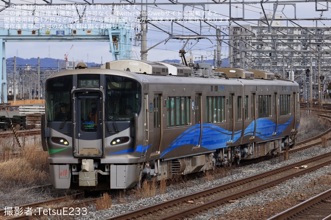 【あい鉄】521系AK19編成 吹田総合車両所本所出場試運転を岸辺駅で撮影した写真