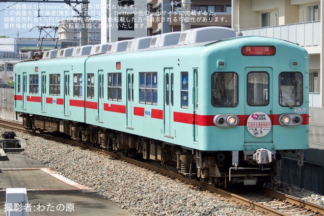 【西鉄】600形606F「アイスグリーン」復刻塗装へ交通安全ヘッドマークを不明で撮影した写真