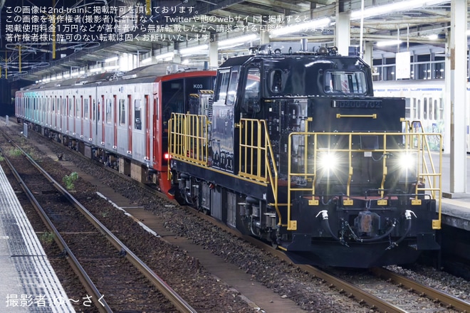 【JR九】303系K03編成が小倉総合車両センターを出場を不明で撮影した写真
