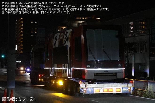 【鹿市交】1000形1014号車が陸送を不明で撮影した写真