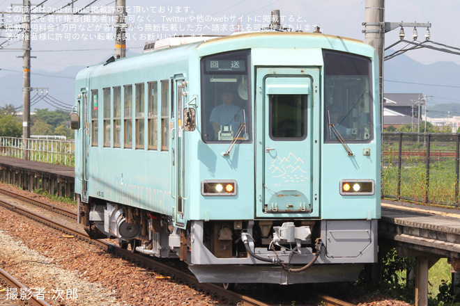 【JR西】キハ120-202が後藤総合車両所を出場し回送 - 高津駅にて撮影