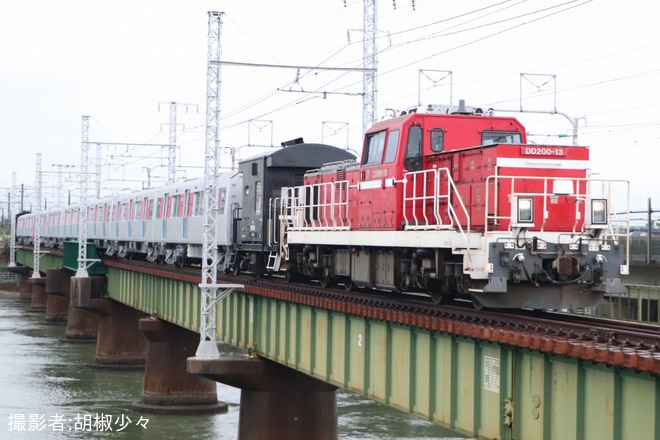 【都営】12-600形12-971Fが日本車輌製造を出場し甲種輸送を不明で撮影した写真